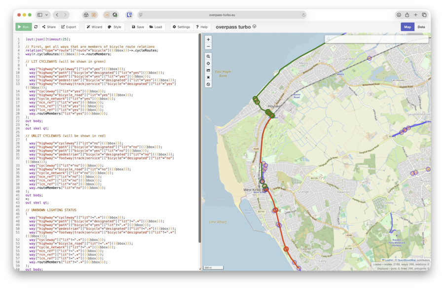 A screenshot of Overpass Turbo web app showing OpenStreetMap query code on the left panel for extracting bicycle route data, with the corresponding map visualization on the right displaying cycling infrastructure around West Kirby and Hoylake areas, where lit cycleways are shown in green, unlit in red, and unknown in blue. There is a roughly even split between green and red, with a little bit of blue.